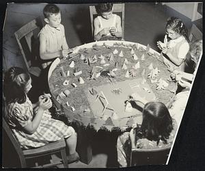 Top left, Jeffries Point branch camping ground. Every wigwam bears a child's name and represents a book read and reported on. In this picture was Alphonse Pantaleone, Julia and Rose Pasquariello, Flora DiFillippo, Pauline Uccello and Anthony Taramino, all of East Boston.