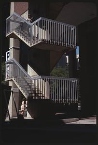 Stairs going up a parking structure