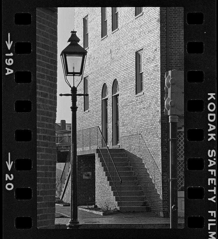 Lamppost and brick building