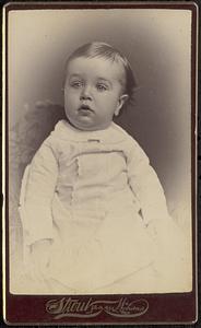 Portrait of a baby in white