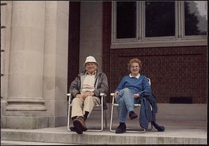 Charles and Peggy Godwin, watching Fourth of July parade from front of Lawrence Library