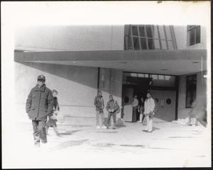 People outside a building