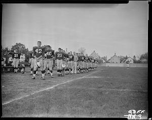 The Springfield College Football Team on the sideline