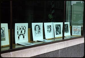 Photographs displayed in window with Recreation Camera Club sign, Somerville, Massachusetts