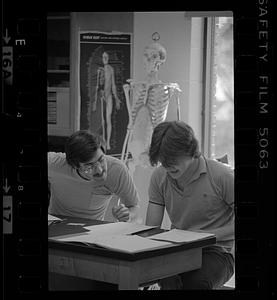 A student being taught in science classroom