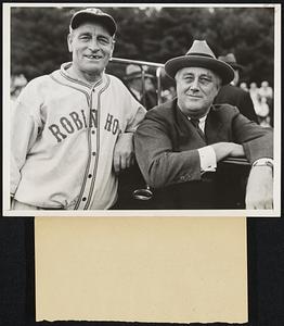 Roosevelt Sees Old Teammate on Visit to Home Town. President Roosevelt meets Arthur DeGraff (left), manager of the Hyde Park Robinhoods baseball team, with whom the President played baseball thirty-five years ago, as the President watched a game between the Robinhoods and Columbiaville on a visit to his home town, Hyde Park.