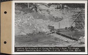 Contract No. 66, Regulating Dams, Middle Branch (New Salem), and East Branch of the Swift River, Hardwick and Petersham (formerly Dana), looking northwesterly at riprap and paving, dam 4, middle branch regulating dams, Hardwick, Mass., Sep. 12, 1939