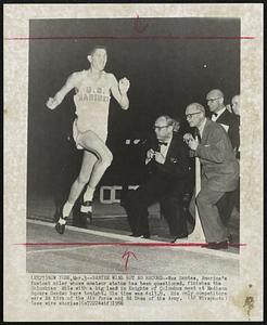 Santee Wins but no Record--Wes Santee, America's faster miler whose amateur status has been questioned, finishes the Columbian Mile with a big lead in Knights of Columbus meet at Madison Square Garden here tonight. His time was 4:13.8. His only competitors were Ed Kirk of the Air Force and Ed Shea of the Army.