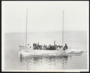 America's First Diesel Life Boat. Here is the first of the new power life boats, just launched at a Newark, N.J. shipyard, now required by the United States Maritime Commission on certain of its new passenger and cargo ships. It is powered by a one-cylinder two-cycle Gray Marine General Motors Diesel engine, and in case of disaster will pick up other life boats and take them in tow.