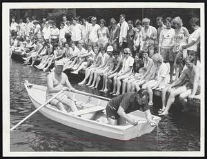 Demonstrators Use Grapnel in showing students proper method of seaching waters for victim. From left in boat are William Reilly, Weymouth Police instructor and John Coutts of Brookline.