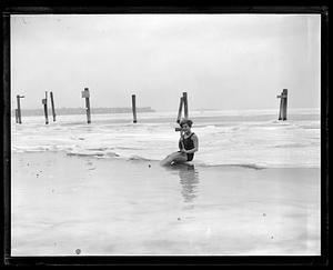 Irene Hesenius takes dip in icy water at Orient Heights, East Boston