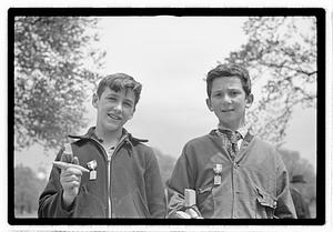Two boys wearing medals