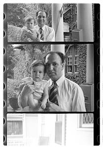 John Sanromá holding a child