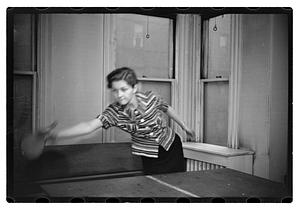A woman playing table tennis
