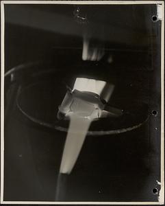 Detail photograph showing sample of artists' oil paint being burned for pigment analysis