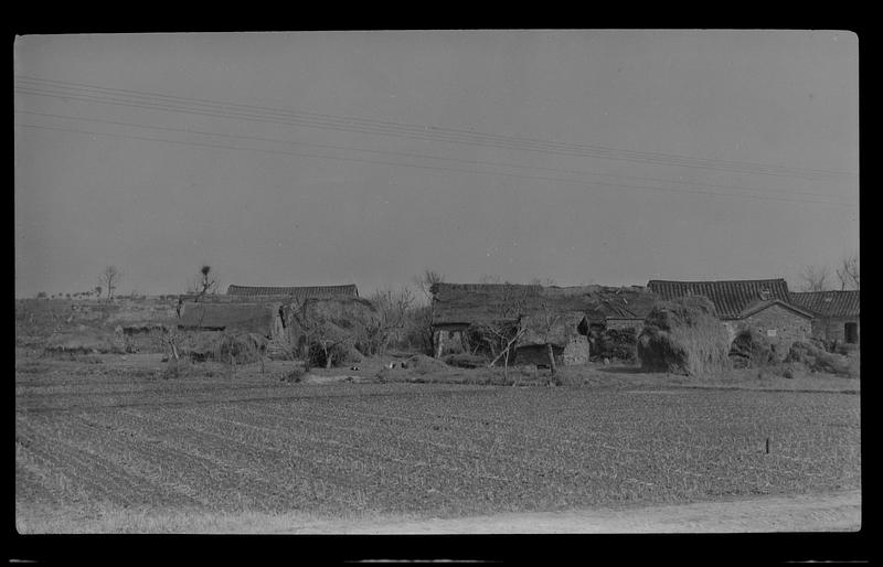 Mud buildings thatched with hay, near campus Southeastern University