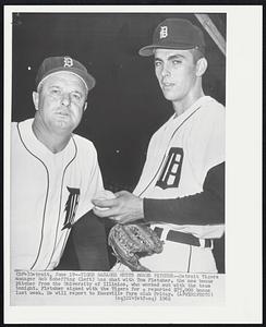 Tiger Manager Meets Bonus Pitcher -- Detroit Tigers manager Bob Scheffing (left) has chat with Tom Fletcher, the new bonus pitcher from the University of Illinois, who worked out with the team tonight. Fletcher signed with the Tigers for a reported $75,000 bonus last week. He will report to Knoxville farm club Friday.