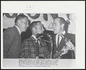 Pirates Celebrate -- Members of the Pittsburgh Pirates celebrate the opening of the World Series at a Civic Pep Rally at Schneley Park tonight. Left to right: Harvey Haddix, Elroy Face and Hal Smith, a catcher. Haddix and Face have won 21 games for the Pirates and Smith, a catcher has batted .295 for the Pittsburghers this year.