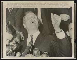 A happy Kevin H. White, the next Mayor of Boston for the next four years, gestures in victory at his headquarters 11/7. White defeated Mrs. Louise Day Hicks, School Committee woman by a small margin.