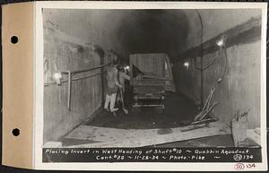 Contract No. 20, Coldbrook-Swift Tunnel, Barre, Hardwick, Greenwich, placing invert in west heading of Shaft 10, Quabbin Aqueduct, Hardwick, Mass., Nov. 28, 1934