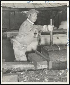 Long Pond. West Rutland, Mass. Uno Kaarto of New Ipswich, N.H. with peavey, putting logs in place for the saw. Do you remember?