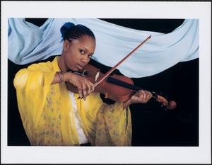 Young woman playing the violin