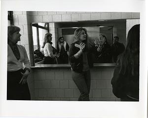 Students socializing in a bathroom