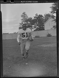 Player running on the field, Edward Toomer