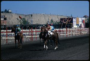 Jockeys and horses on track, Calgary Stampede, Alberta