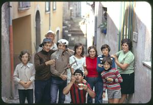 Group posing in street, Roccasicura, Italy