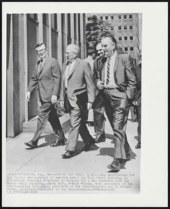 Arrive for Steel Talks--Top negotiators for the United Steelworkers of America enter the U.S. Steel building in Pittsburgh Thursday afternoon to bargain for a new contract with the basic steel industry. From left, Joseph Molony, vice president of the steelworkers; I.W. Abel, president of the steelworkers; and J. Walter Burke, secretary-treasurer of the steelworkers.