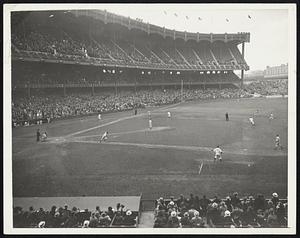 Di Maggio’s Single Ties the Score. A general view of the game between the Yankees and the Boston Red Sox showing DiMaggio at bat. He singled scoring Hadley from second to tie the score in the 7th inning. The Yanks won 5-4 after a 12 inning fight.