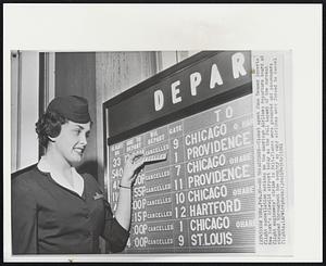 New York – No Departures – Ticket agent June Teumer inserts flight cancellation notices on the American Airlines departure board at New York's Idlewild airport today as the full impact of the current flight engineers’ strike is felt. Planes were grounded and passengers stranded throughout the country as many airlines were forced to cancel flights.