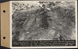 Contract No. 80, High Level Distribution Reservoir, Weston, looking south from center line aqueduct at Sta. 890+80 showing rotten bedrock at top, high level distribution reservoir, Weston, Mass., Apr. 16, 1940