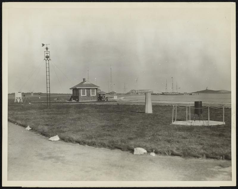 A general view of the new meteorological observatory at the research station of Massachusetts Institute of Technology on the estate of Colonel E.H.R.Green at Round Hill, Mass. The building has a laboratory for making scientific studies of weather, particularly the physical characteristics of fog, and a room where the records of the various instruments are interpreted for daily weather maps and forecasts. Beyond the observatory lies the great Round Hill Airport, one of the finest in the country.