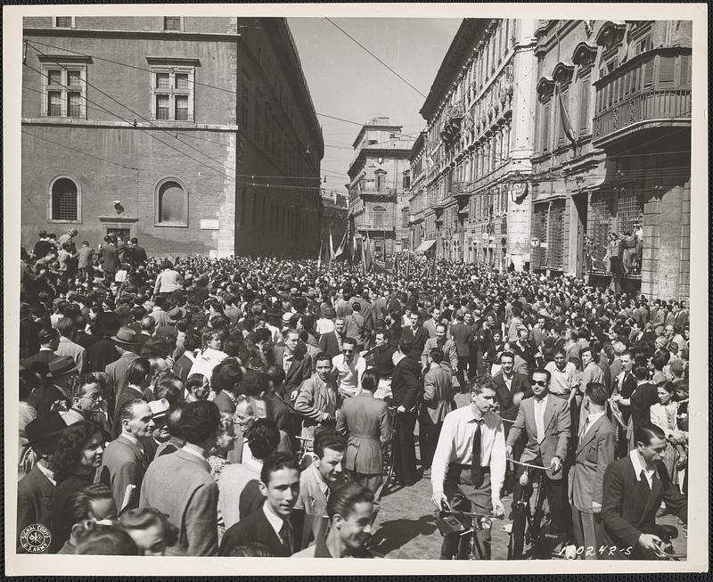 Hordes of overjoyed civilians turned out to cheer Americans in the Palazzo Venezia