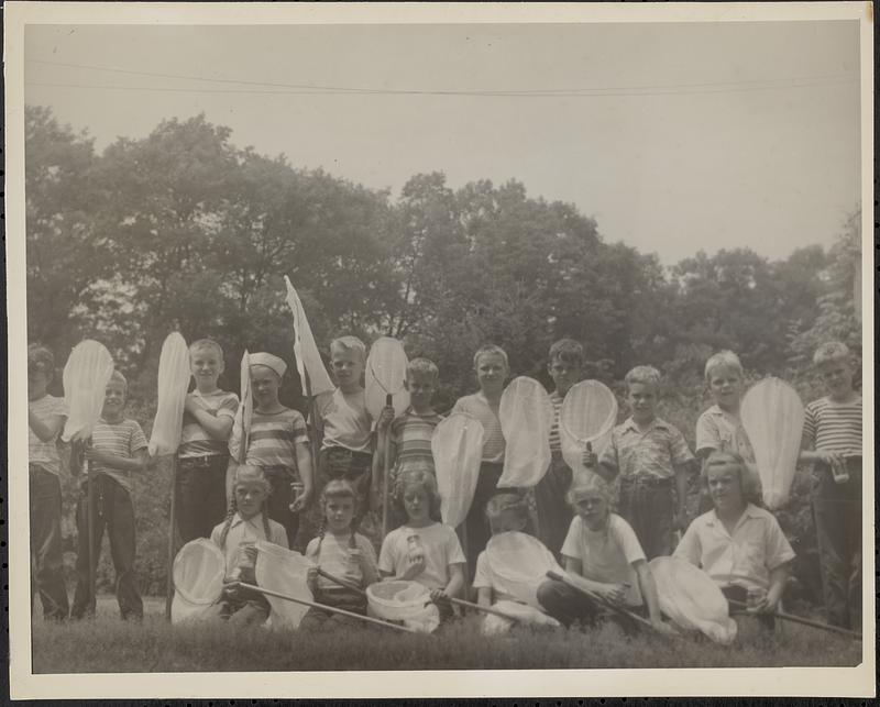 Campers at Moose Hill Audubon Sanctuary day camp, shown holding butterfly nets