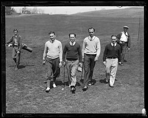 Golfers walking