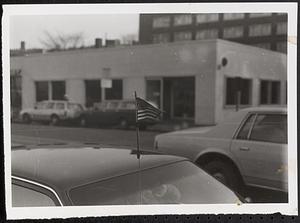 American flag on a car antenna