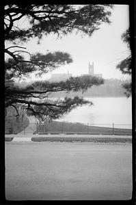 Gasson Hall in background, body of water and street in foreground