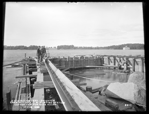 Distribution Department, Chestnut Hill Reservoir, cofferdam for gatehouse for Low Service Pumping Station; Effluent Gatehouse No. 1 in background, right, Brighton, Mass., Oct. 3, 1899