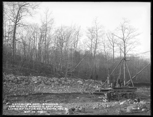 Distribution Department, Low Service Spot Pond Reservoir, laying riprap on south shore of Section 4, from the south, Stoneham, Mass., Nov. 29, 1899