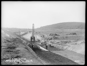 Wachusett Reservoir, North Dike, westerly portion, driving 6-inch sheeting in main cut-off trench, Clinton, Mass., Dec. 1899