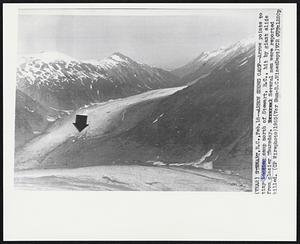 Stewart, B.C. -- Arrow Shows Camp -- Arrow points tiny logging camp north of Stewart, B.C., hit by giant slide from glacier Thursday. Several men were reported killed.