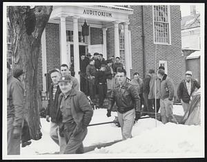 General Motors workers leave Dennison Hall following a strike meeting.