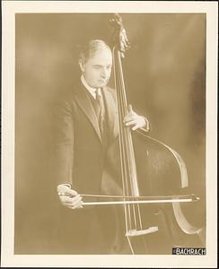 Serge Koussevitzky posed with a double bass