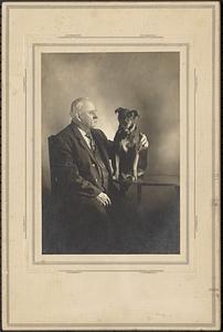 Ezra Goss, photographer, with dog