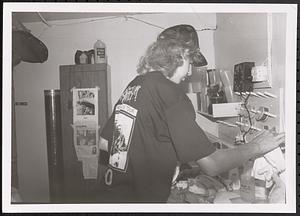 Young man in art class making tie-dye shirts