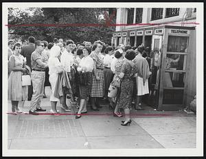 Waiting For Telephones, Six Lines Deep Outside Park Street Subway Station.