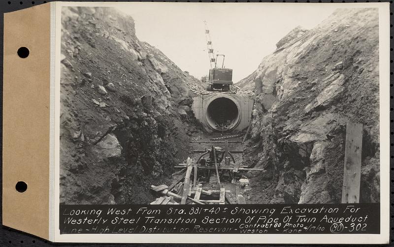 Contract No. 80, High Level Distribution Reservoir, Weston, looking west from Sta. 881+40+/- showing excavation for westerly steel transition section of pipe of twin aqueduct line, high level distribution reservoir, Weston, Mass., Apr. 17, 1940